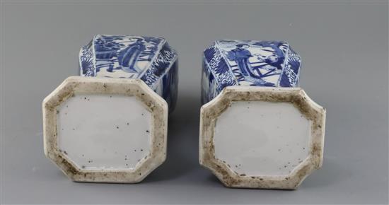 A pair of Chinese blue and white canted rectangular baluster vases, Kangxi period, H.26.7cm, one neck with section lacking obscured by